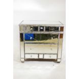 A contemporary mirror glass chest of two over four drawers, A/F glass cracked on three drawers,