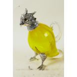 A vaseline glass liqueur/condiment jug in the form of a parrot with silver plated head and legs,