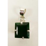 A striking pendant featuring a 12ct square cut natural green emerald, set in sterling silver,