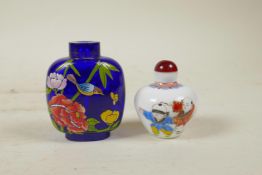 A Peking glass style snuff bottle with enamelled decoration of boys playing, and another in blue