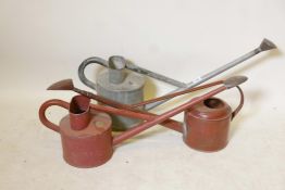 A vintage Haws patent watering can and two others similar, 32" x 10"