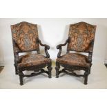 A fine pair of C19th Continental open arm chairs with crisp carved decoration, hump backs and shaped