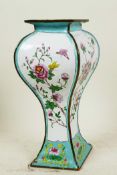 An unusual Oriental enamel vase of rectangular section decorated with flowers, butterflies and