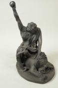 A Japanese bronzed metal figure cast as a victorious looking ugly man sitting on a tiger, 9" high