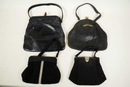 A collection of vintage handbags: Two Art Deco evening bags in black silk crepe de chine with