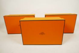 Three original Hermes Paris gift boxes, all filled with a white satin cushion, 9" long x 6" deep x