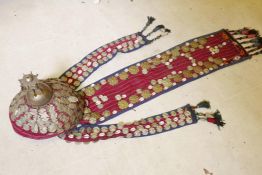 An Indo-Persian headdress with attached pressed metal mounts and shells, 45" long