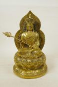 A Chinese filled gilt bronze of an emperor seated on a lotus throne, character mark verso and 4