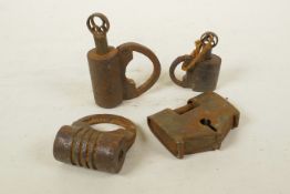 Four antique metal padlocks, largest 3"