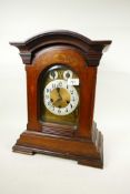A C19th walnut cased mantel clock with three train movement with silent/chime selection, etched