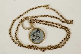 A gold mounted Japanese Irogane pendant depicting figures on a 9ct gold belcher link chain, gross