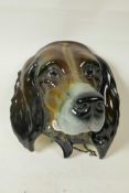 An Art Deco Beswick ware ceramic wall plaque modelled as the head of a spaniel, hand painted with