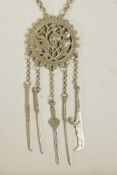 A Chinese white metal chatelaine style pendant necklace with pierced fruiting branch decoration,
