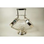 An Art Deco style cut glass and silver plate double biscuit barrel