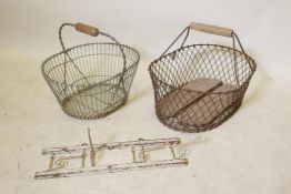 A gardener's wire basket, 19" x 14", and another similar, and a French painted wood and metal