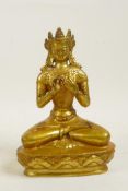 A Sino Tibetan gilt bronze of buddha seated in meditation, impressed double vajra mark to base, 8"