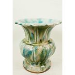 An Oriental stoneware vase with wide lobe shaped flared rim, embossed mark to base, 8½" high and