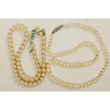 A good vintage real pearl necklace with silver clasp, 17" long, together with a cultured pearl