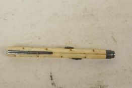 A C19th bone handled pencil and ink pen with pen knife blades, 4¼" long closed