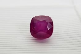 A 9.58ct red ruby, cushion mixed cut, IDT certified, with certificate