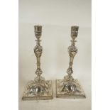 A pair of early C19th Adam style  Sheffield silver plated candlesticks, 12" high