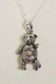A 925 silver teddy bear pendant necklace with articulated limbs