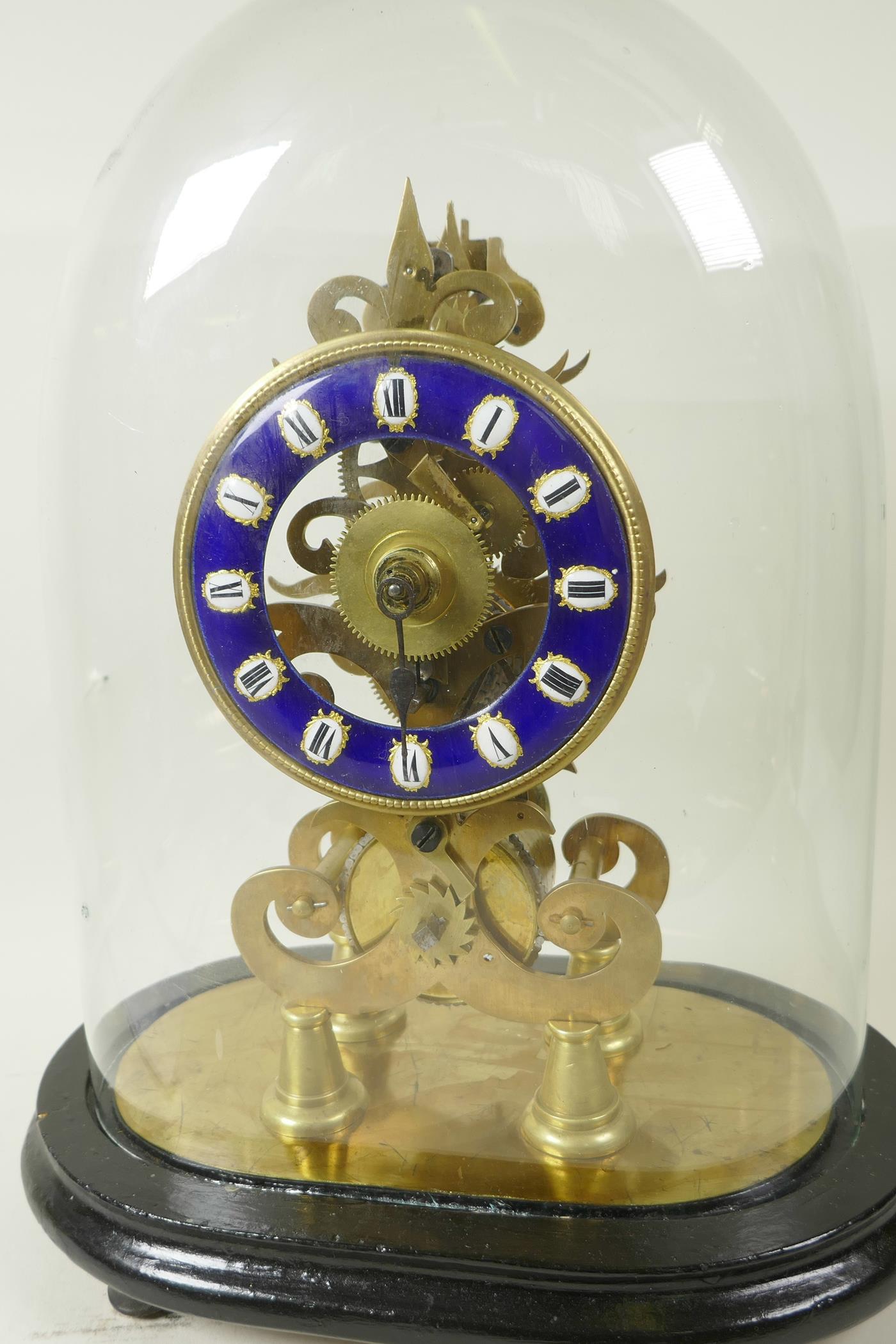 A replica brass skeleton clock with fusee movement and blue enamel chapter ring in Roman numerals, - Image 2 of 5