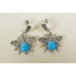 A pair of silver, marcasite and turquoise set drop earrings in the form of winged insects, 1" drop