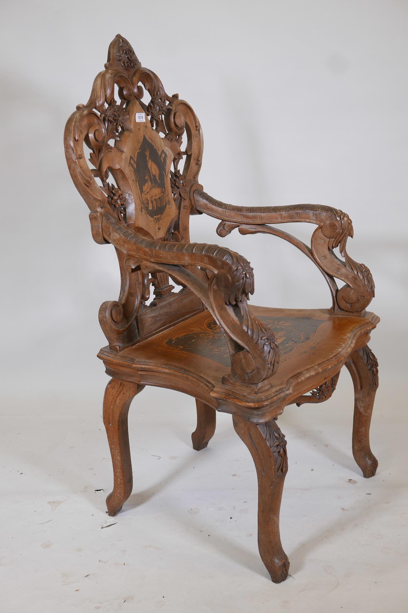 A C19th Swiss inlaid walnut musical open armchair with carved and pierced back and arms, 47½" high - Image 3 of 10