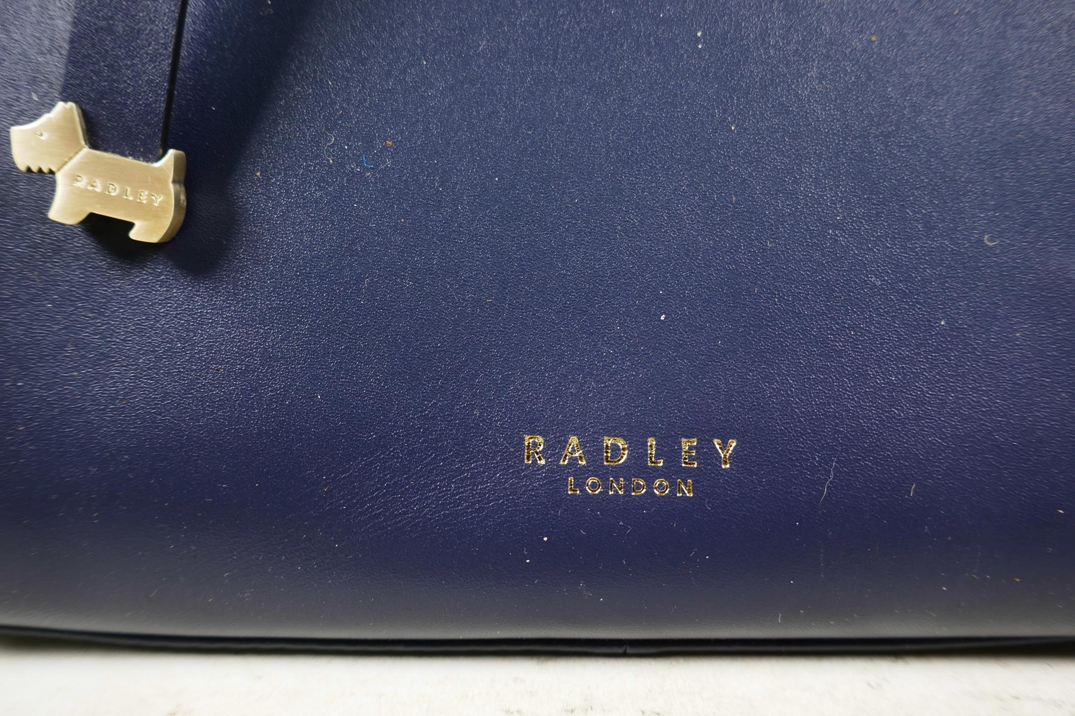 Four contemporary leather and faux leather handbags, including a new navy leather Radley small - Image 3 of 9