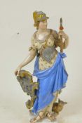 A Continental porcelain allegorical figure of a female with spear and shield, with spotted owl at