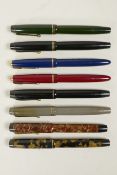 A collection of eight Parker 'Victory' fountain pens with 14ct nibs, 5" long