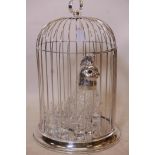A nickel/silver plated liqueur set in the form of a cockatoo in a cage, with eight shot glasses,