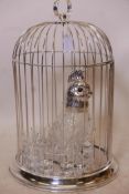 A nickel/silver plated liqueur set in the form of a cockatoo in a cage, with eight shot glasses,