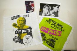 A collection of punk ephemera to include a photograph of Joe Strummer peforming in the Clash, a