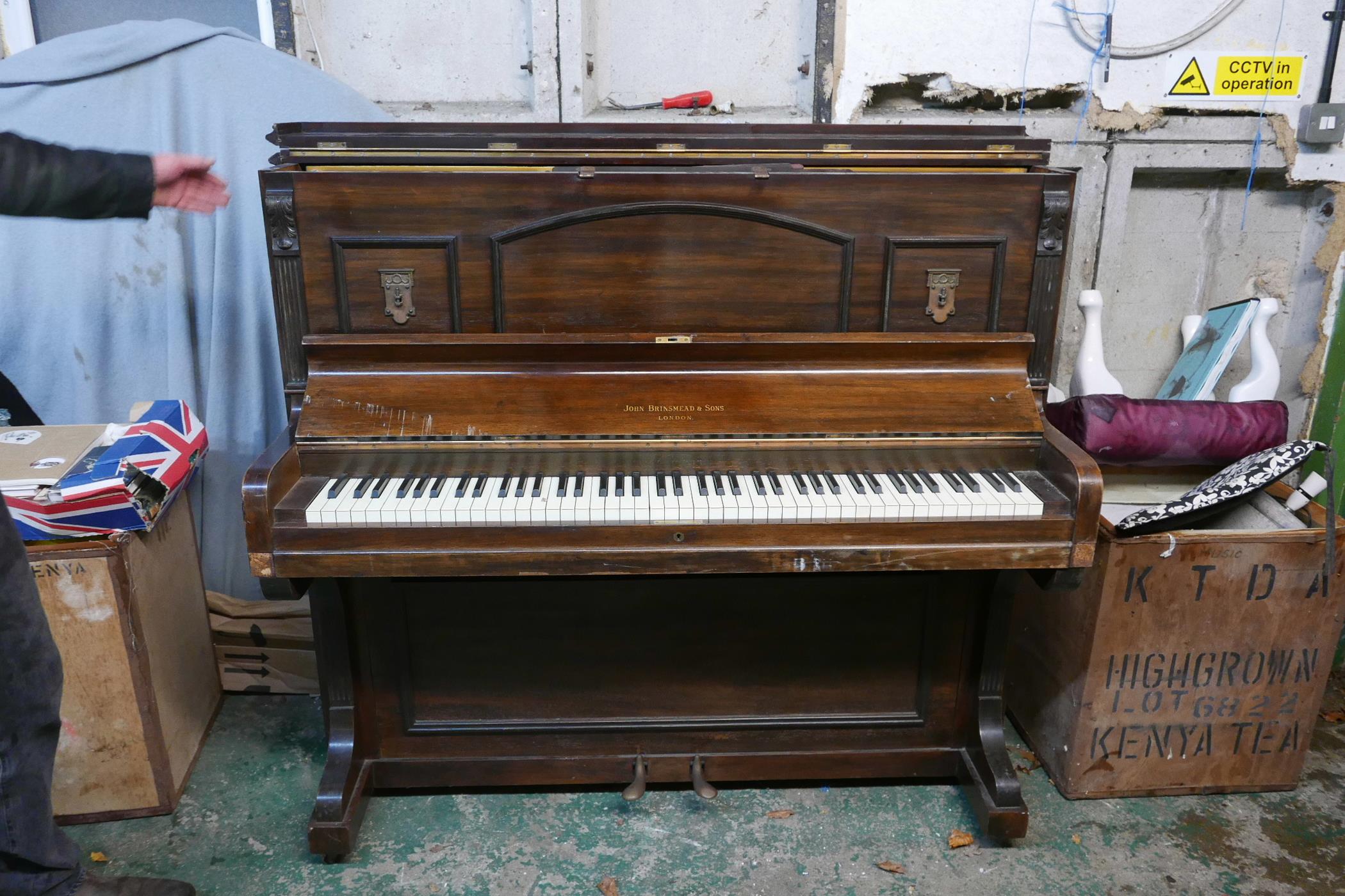 A John Brinsmead and Sons upright piano, with a rosewood case and iron frame, 56" x 26" x 51" - Image 2 of 6