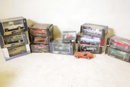 Fourteen 1.18 scale model cars including a Ferrari, Land Rover etc, Eagle, Burago and Maisto,