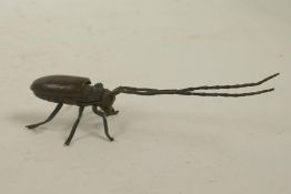 A Japanese Jizai style bronze of a beetle with articulated limbs, antennae and carapace, 5" long