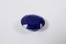 An 11.00ct blue natural sapphire, oval mixed cut, IDT certified with certificate