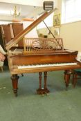 An early C20th rosewood Bechstein Model A Grand Piano, the metal frame numbered 124024, raised on
