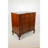 A good late C19th/earlyC20th burr walnut shaped front chest of four long drawers, with brass drop