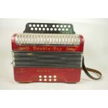 A 1970s Hohner Double Ray Black Dot accordion, in pearl red, model no.1622, Irish style diatonic