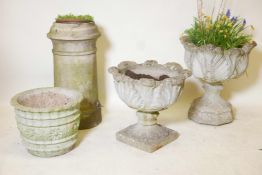 Two concrete garden urns, a concrete garden jardiniere and a terracotta chimney