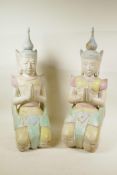 A pair of Thai carved and painted wood figures kneeling in prayer, 21½" high, A/F