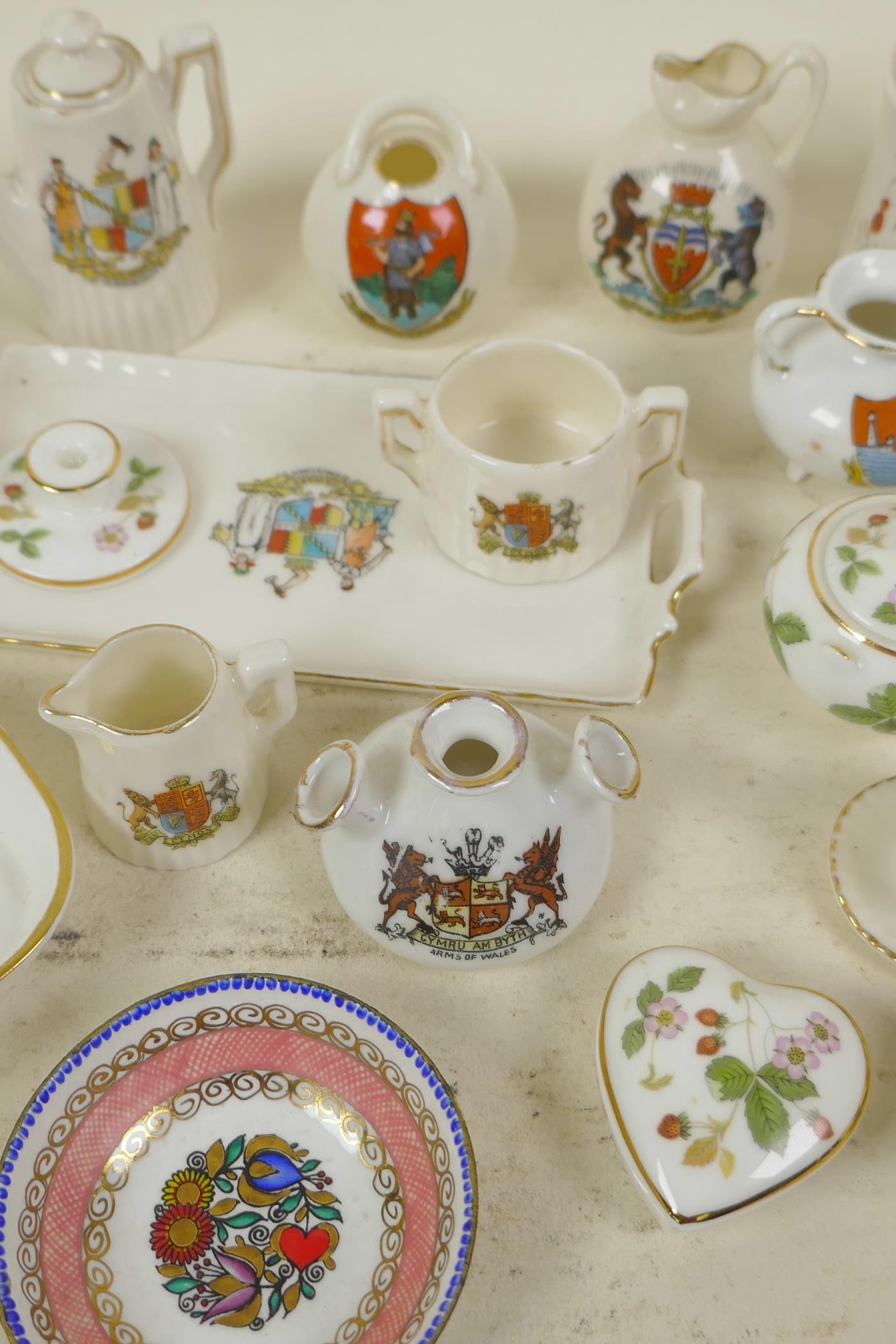 A collection of miniature porcelain items including a Wedgwood doll's tea set, crested ware etc - Image 3 of 4