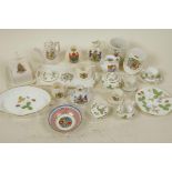 A collection of miniature porcelain items including a Wedgwood doll's tea set, crested ware etc