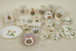 A collection of miniature porcelain items including a Wedgwood doll's tea set, crested ware etc