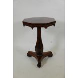 A William IV rosewood occasional table, with octaganol top and carved frieze with drop finials,