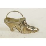 A silver plate with 925 mark pincushion in the form of a lady's high heel shoe, 2½" long, cushion
