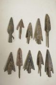 A collection of ten archaic style bronze arrowheads, 3" longest